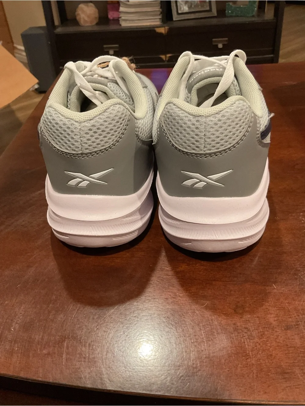 Men's grey running shoes on box size 9